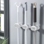 Vedd meg online Háztartási eszköz fali tartó 70x70x45mm öntapadós